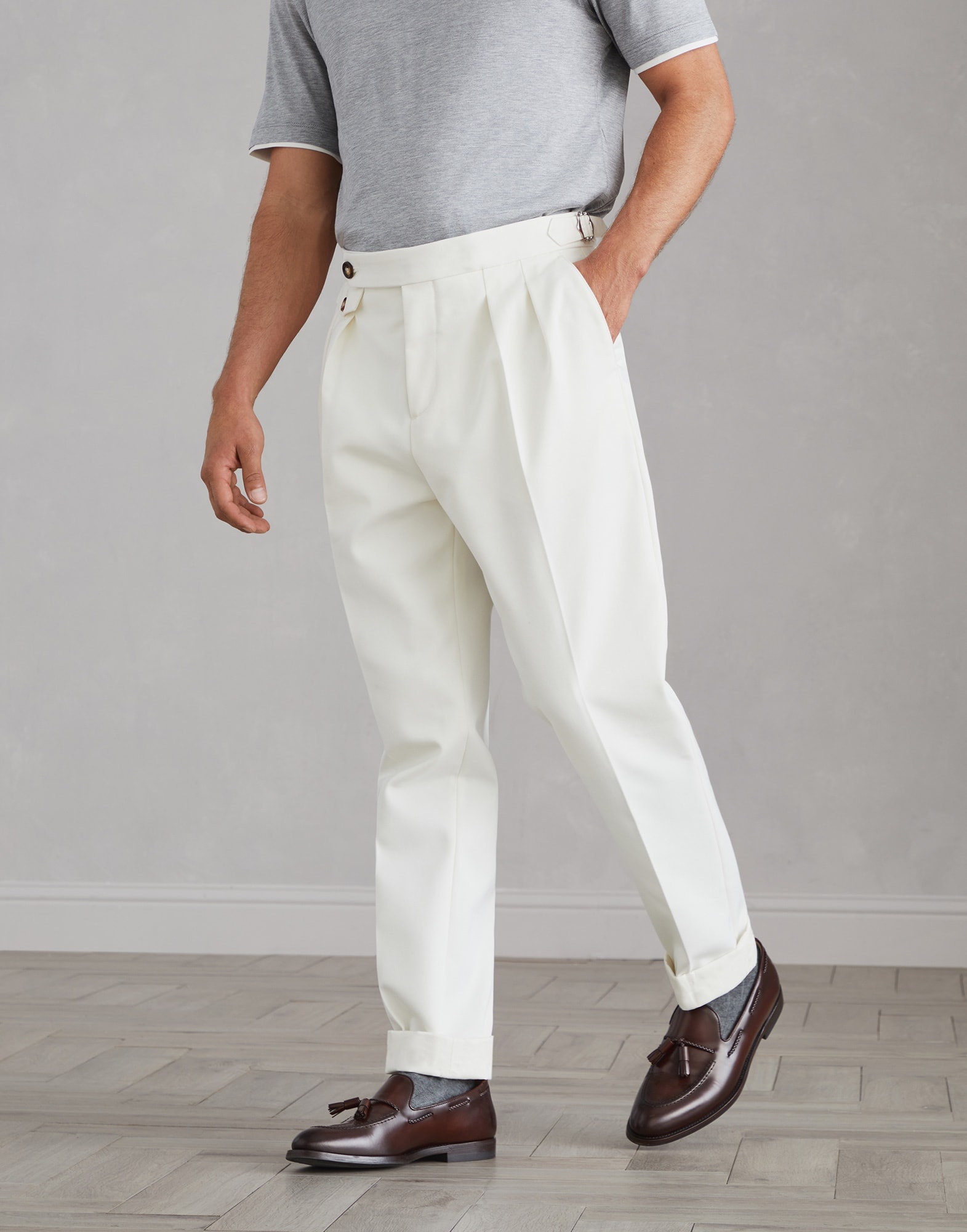 Cotton and virgin wool gabardine tailor fit trousers with reversed double pleats and waist tabs - 1