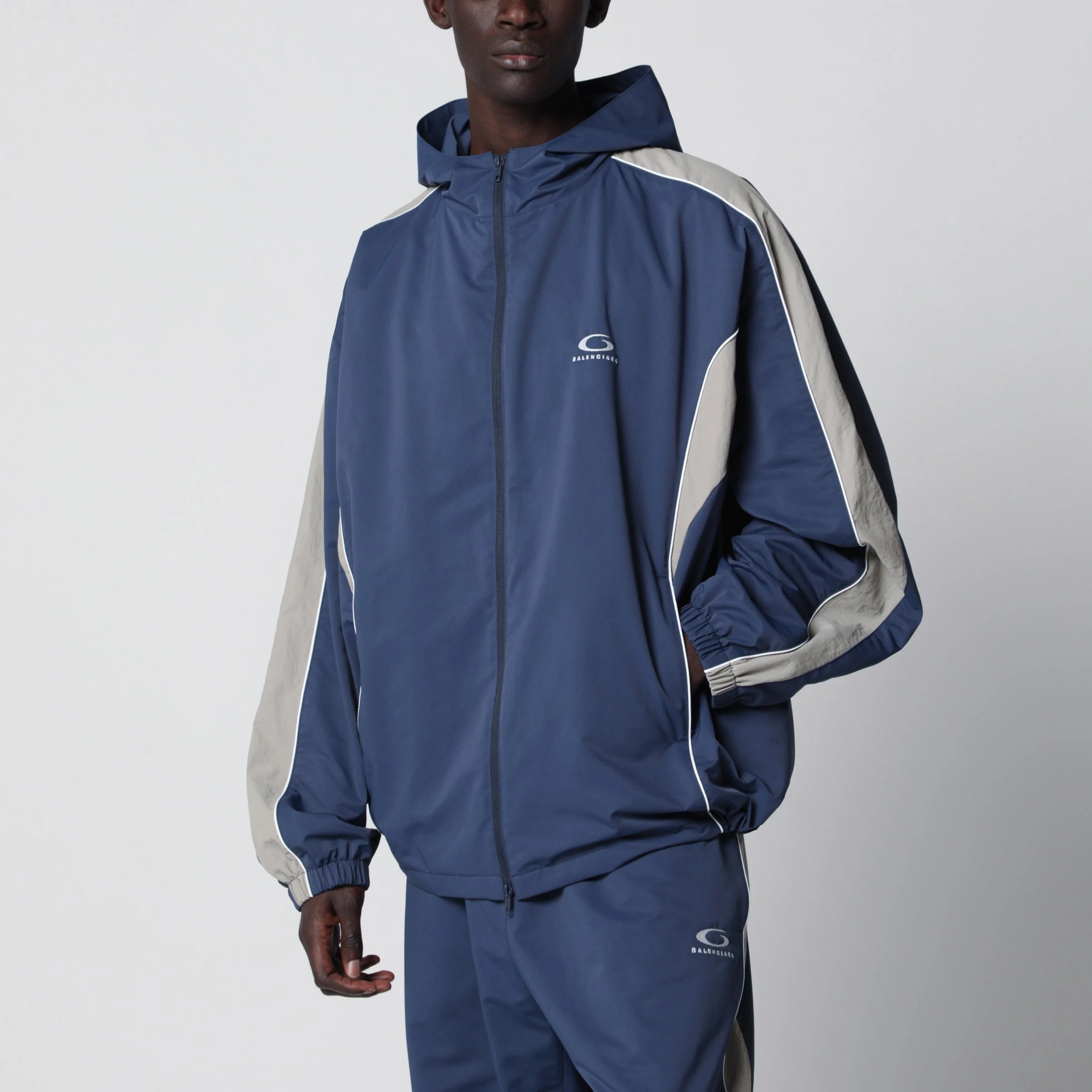 Washed-effect technical satin track jacket in navy - 1