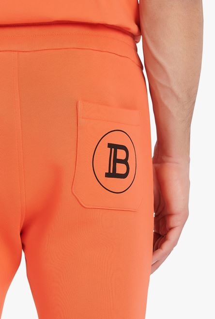 Orange cotton sweatpants with black Balmain Paris logo print - 8
