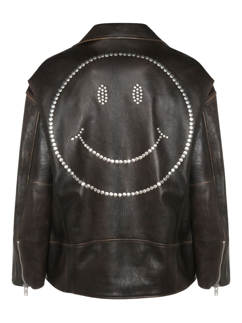 Moschino smiley-face studded leather jacket outlook