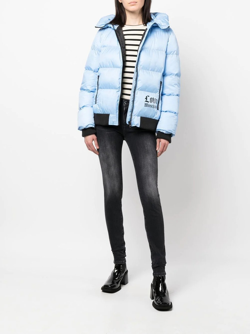 Moschino logo-print skinny-cut jeans outlook