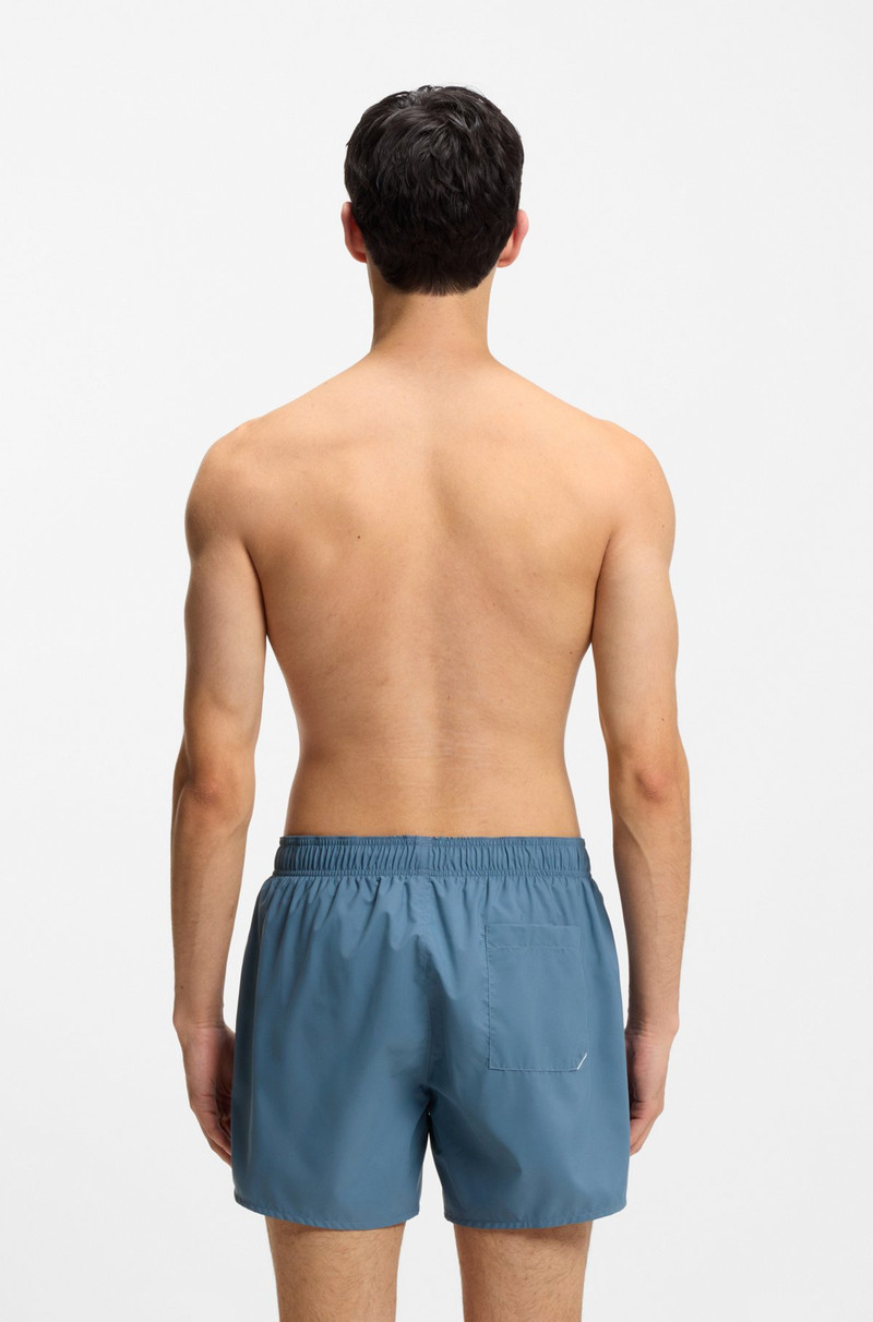 HUGO SWIM SHORTS WITH VERTICAL LOGO PRINT outlook