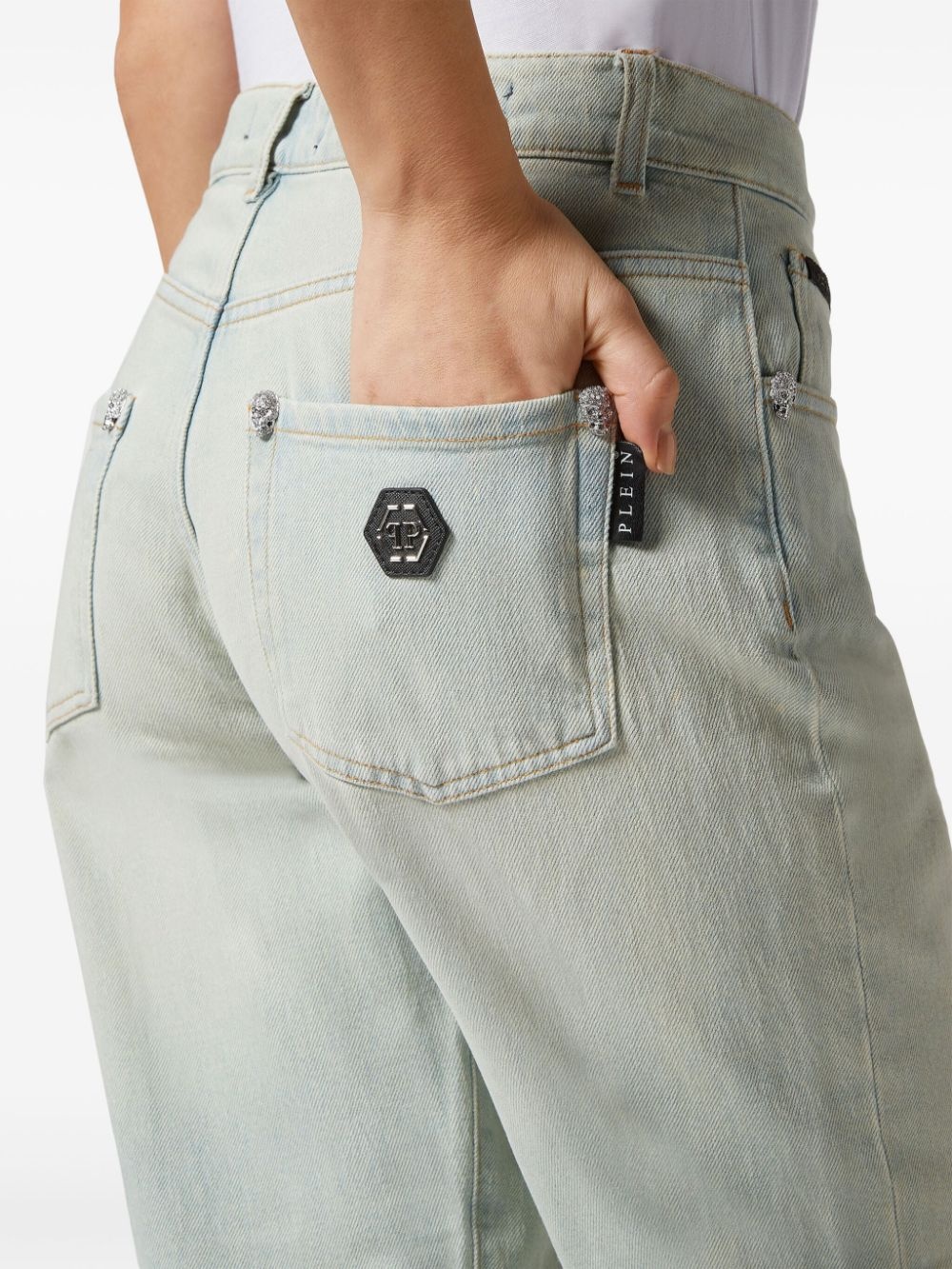 skull-studded tapered jeans - 4