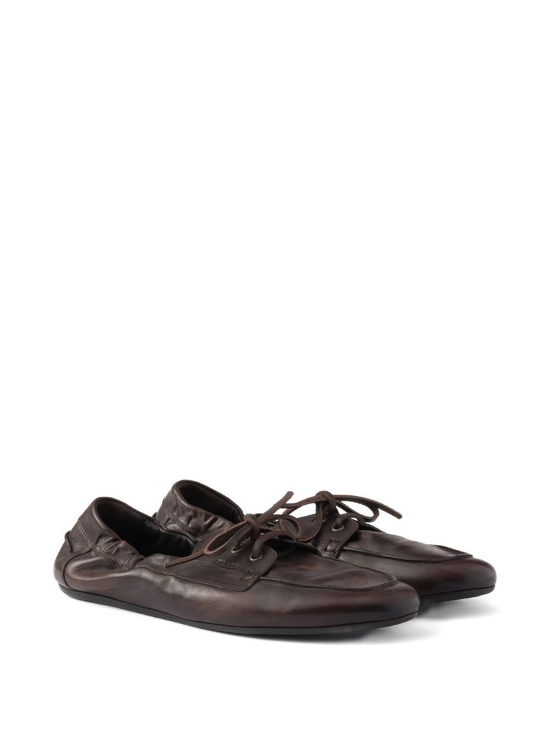 Prada Shuffle Antiqued lace-up boat shoes outlook