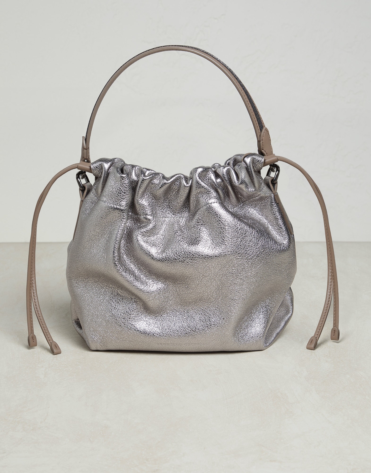 Lamé leather bucket bag with shiny handle - 1