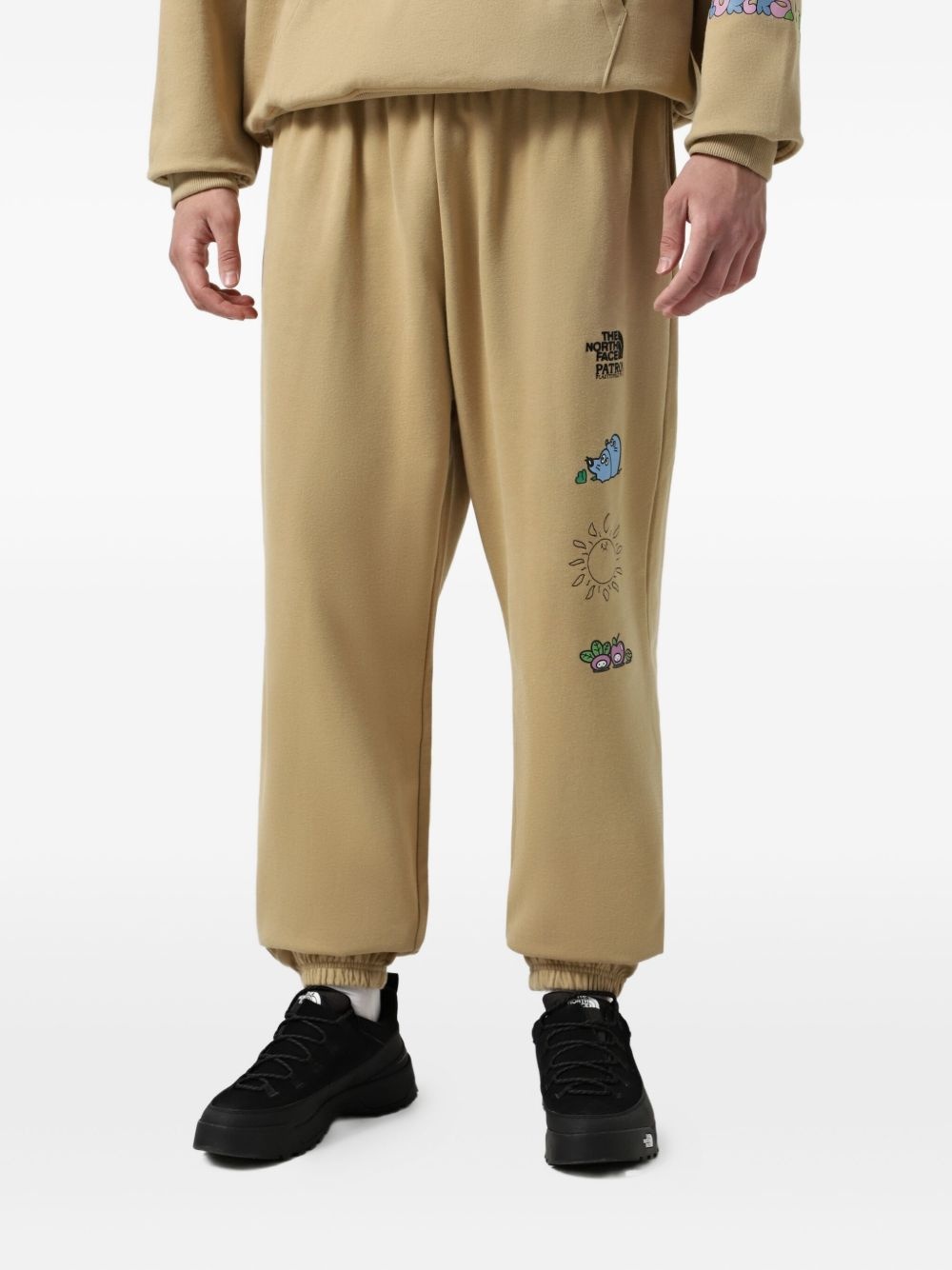 Mountain Cleanup graphic-print track pants - 3