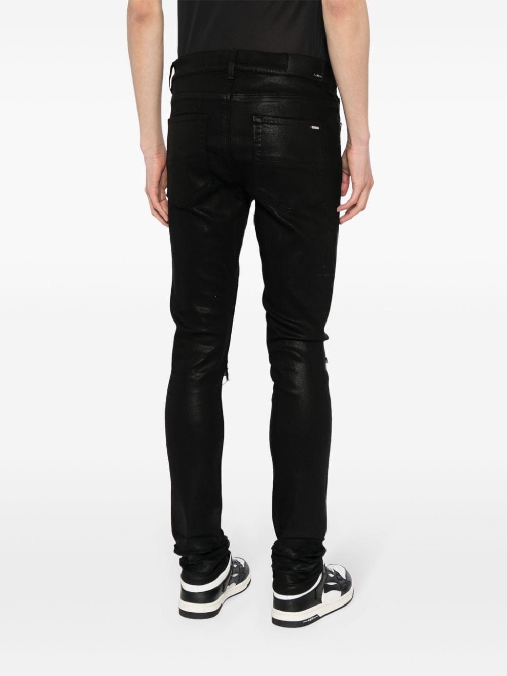 logo-embroidered distressed slim-cut jeans - 4
