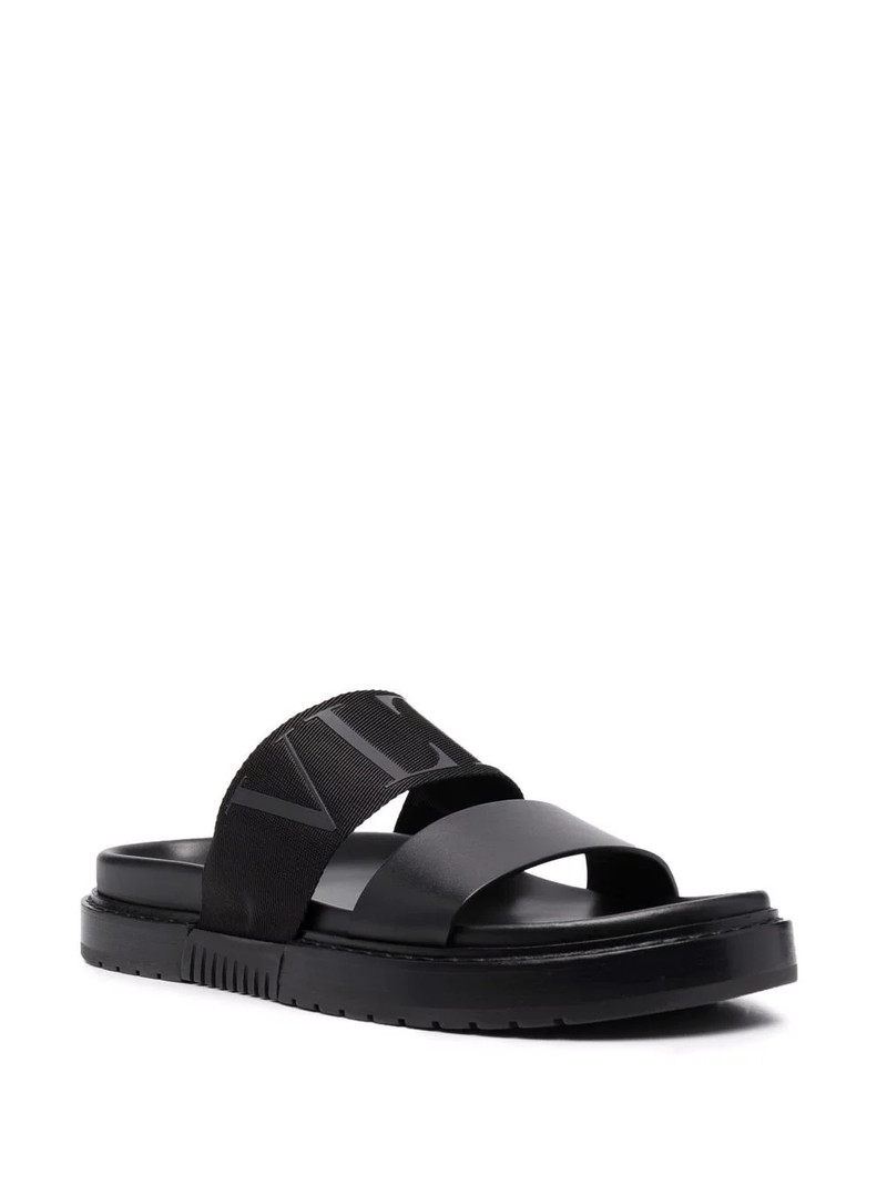 Valentino logo-embossed leather slides outlook