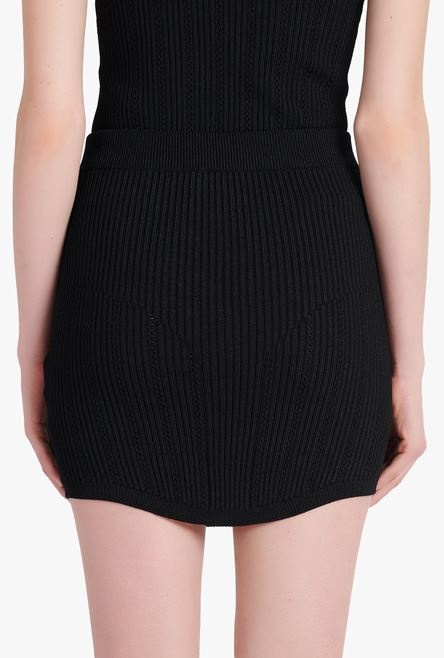 Short black eco-designed knit skirt with double-buttoned fastening - 8