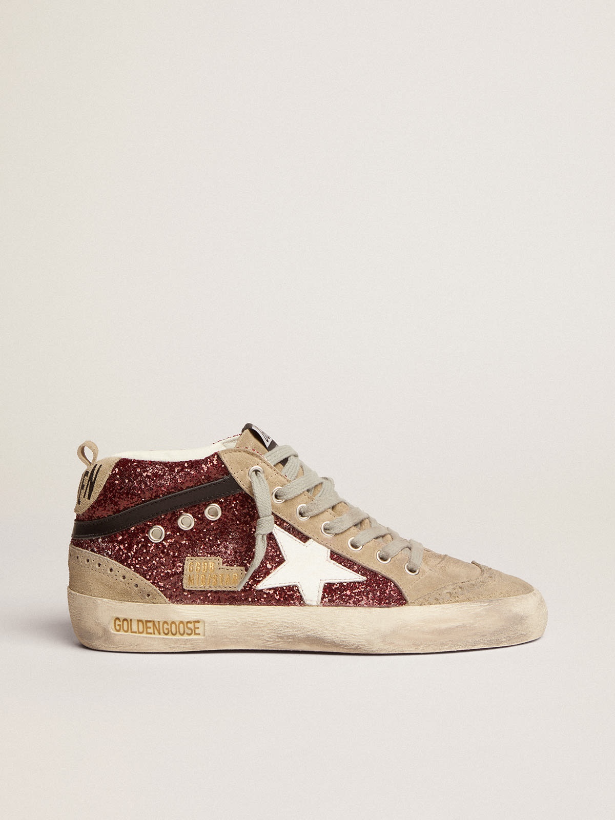 Mid Star sneakers in burgundy glitter with dove-gray inserts and white star - 1