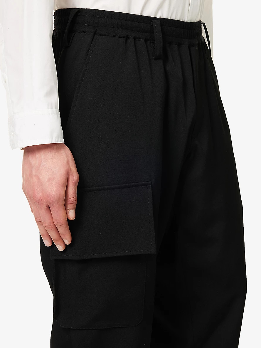 Flap-pocket mid-rise tapered-leg wool trousers - 5