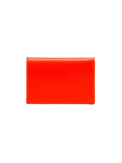 Comme Des Garçons fluorescent orange leather wallet outlook