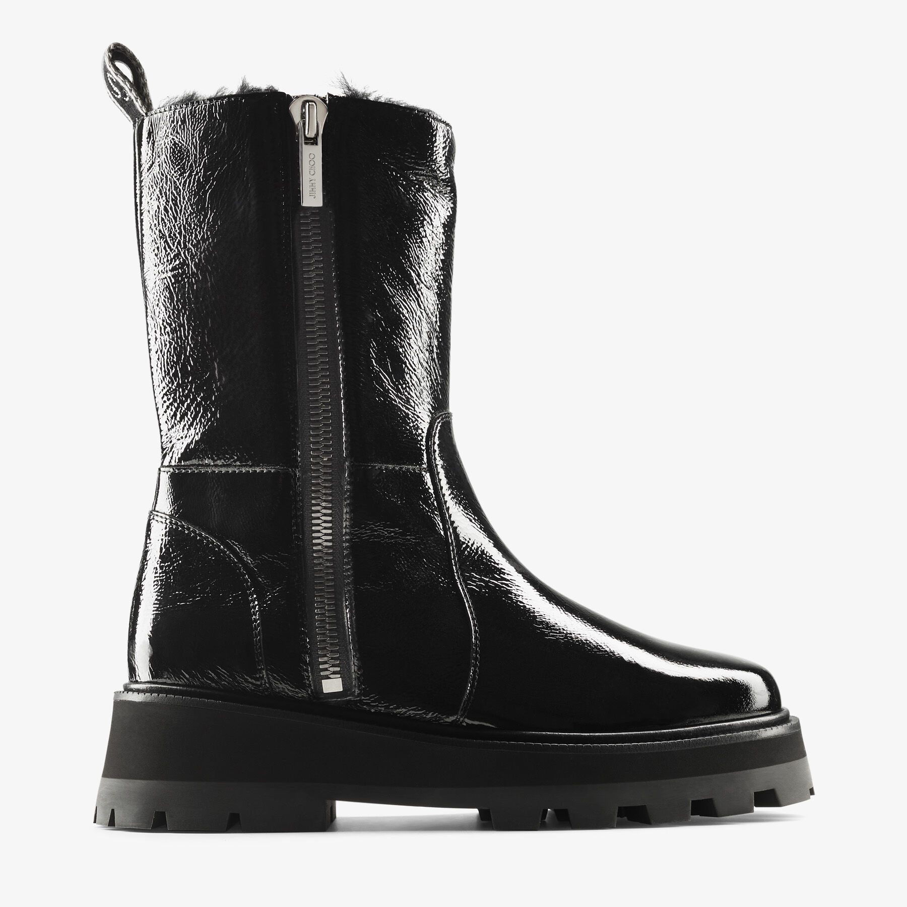 Bayu Flat
Black Soft Patent Boots with Shearling - 1