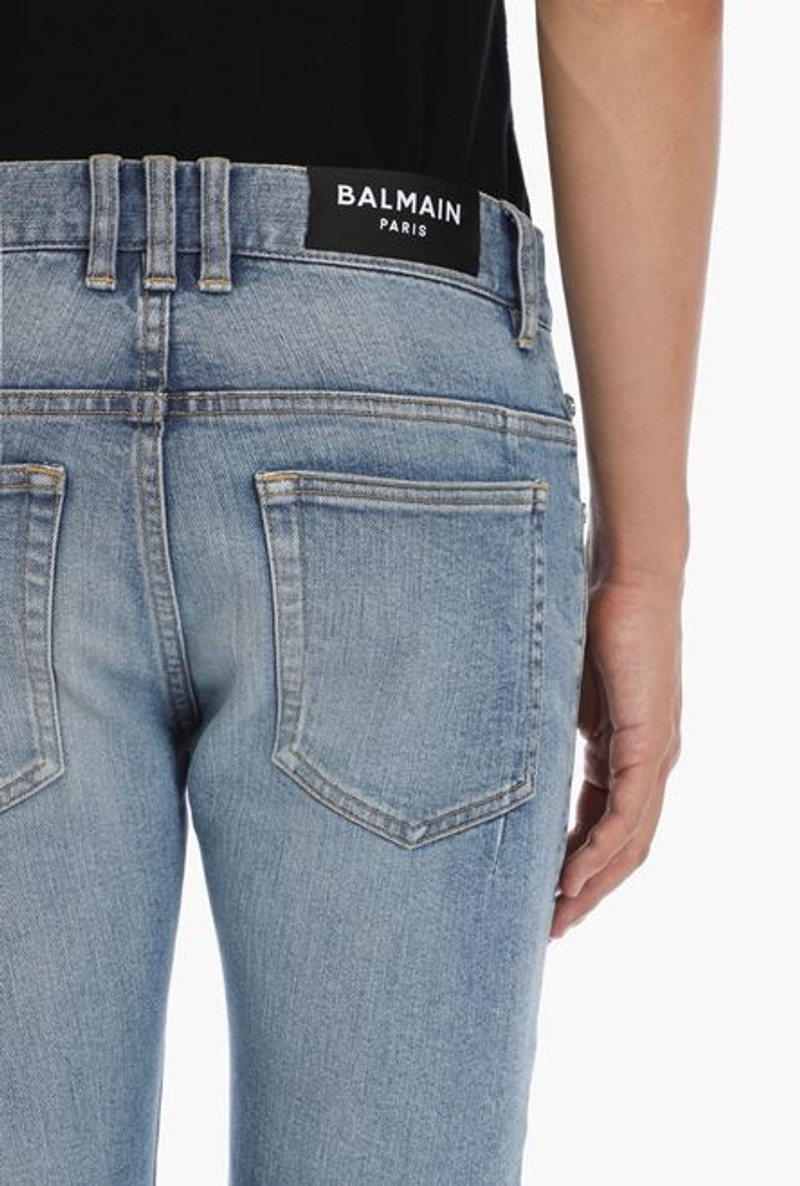 Slim-cut ripped blue cotton jeans with synthetic leather panels 5