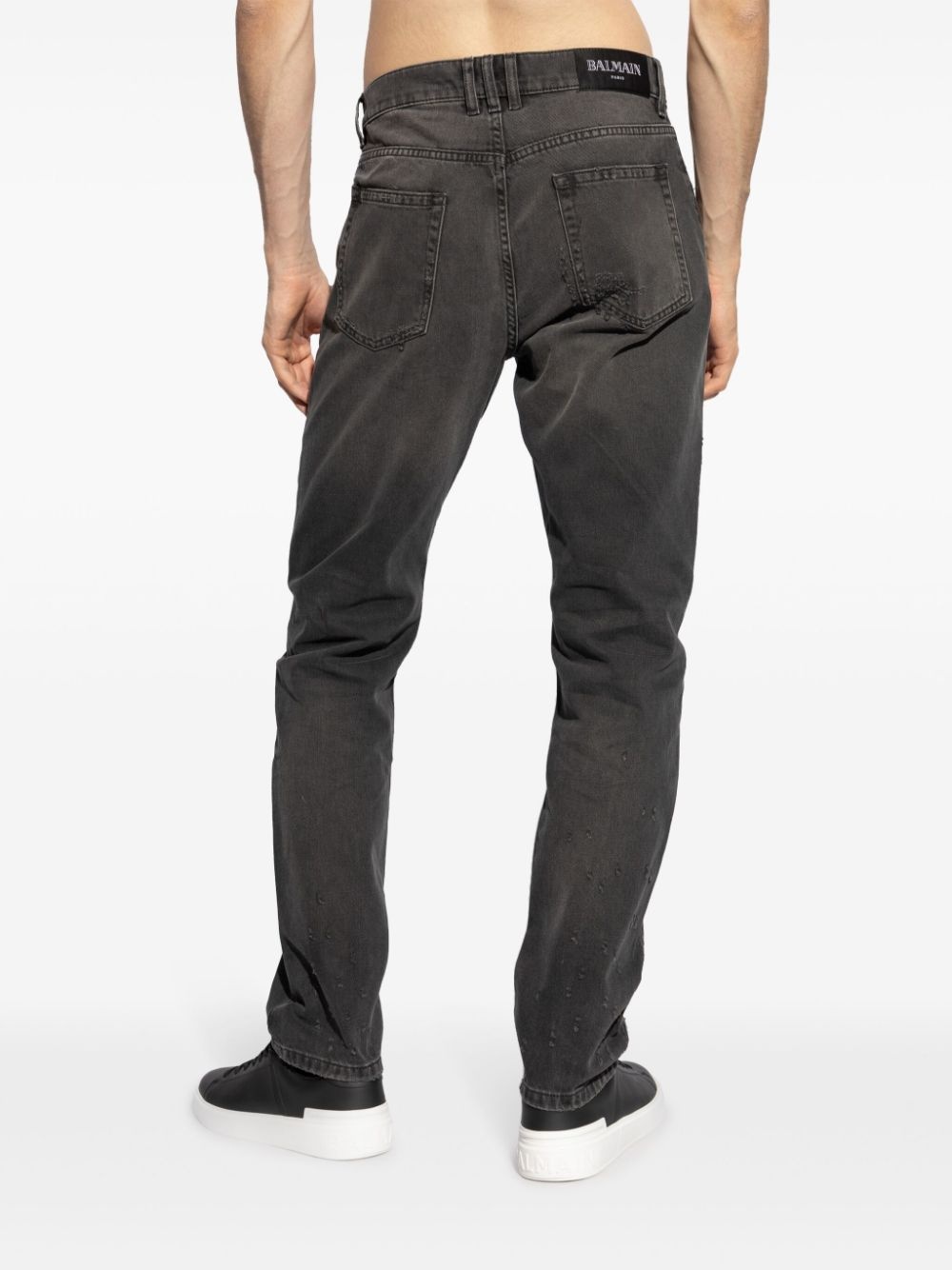 distressed finish slim-cut jeans - 4