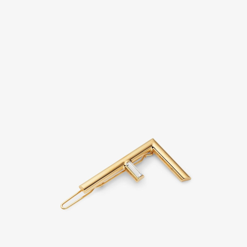 Hair clip with Fendi First logo. Made of gold-finish metal. Decorated with Baguette-cut white crysta 1