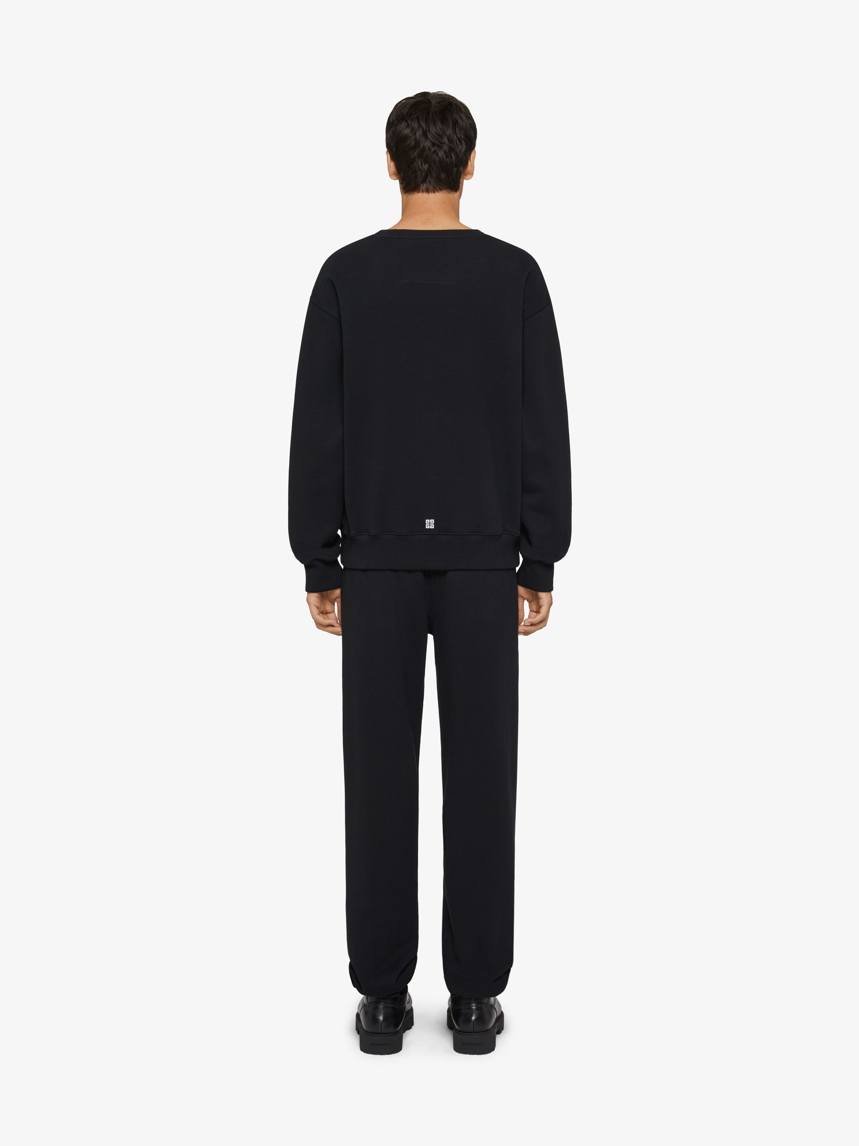 JOGGER PANTS IN FLEECE WITH REFLECTIVE ARTWORK - 4