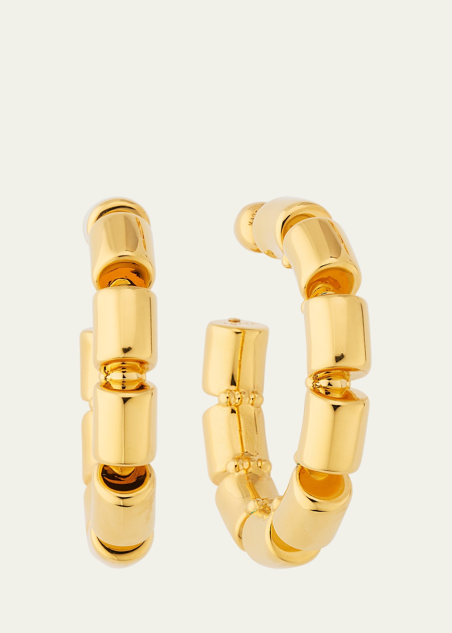Alaïa Goldtone Coil Hoop Earrings | bergdorfgoodman | REVERSIBLE