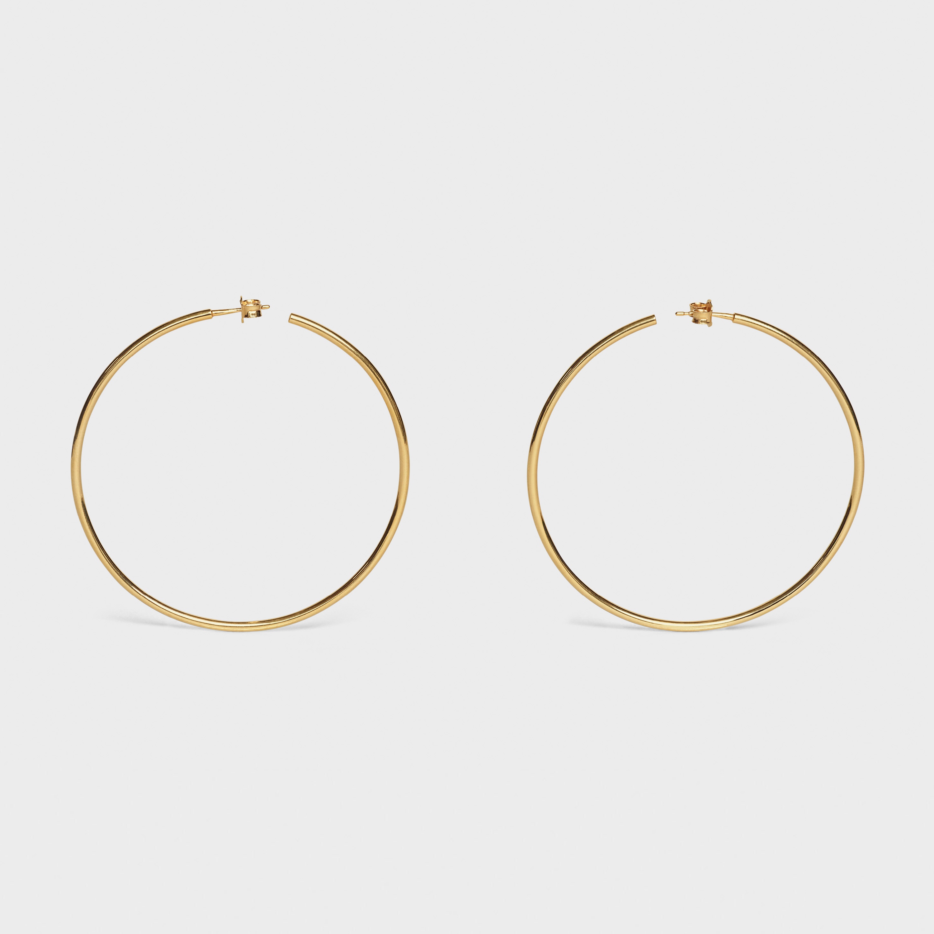 SIMPLE FORMS ROUND HOOPS IN BRASS WITH GOLD FINISH - 1