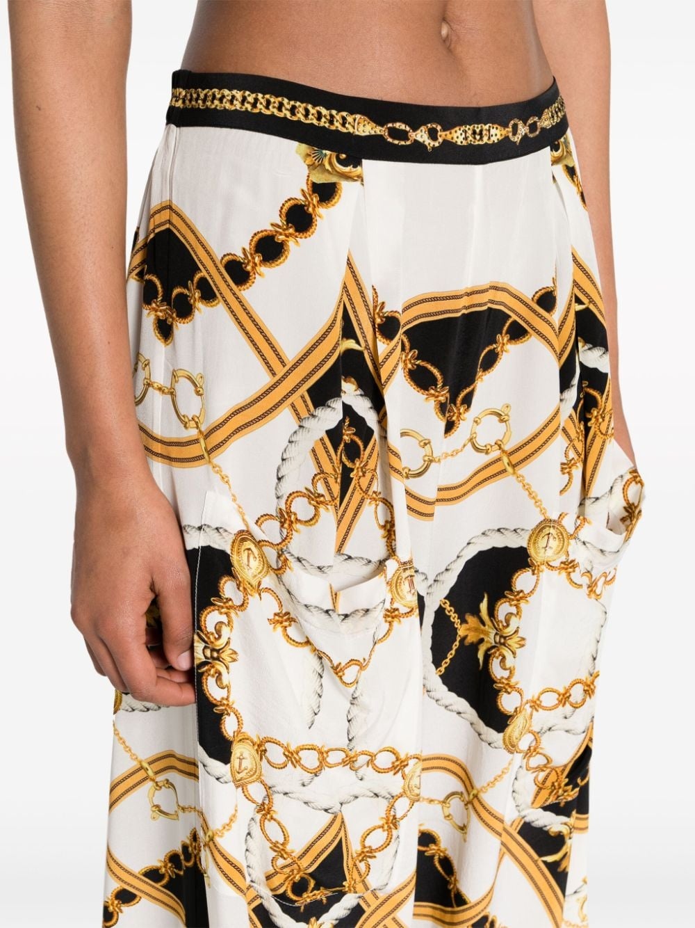 graphic-print silk flared trousers - 5