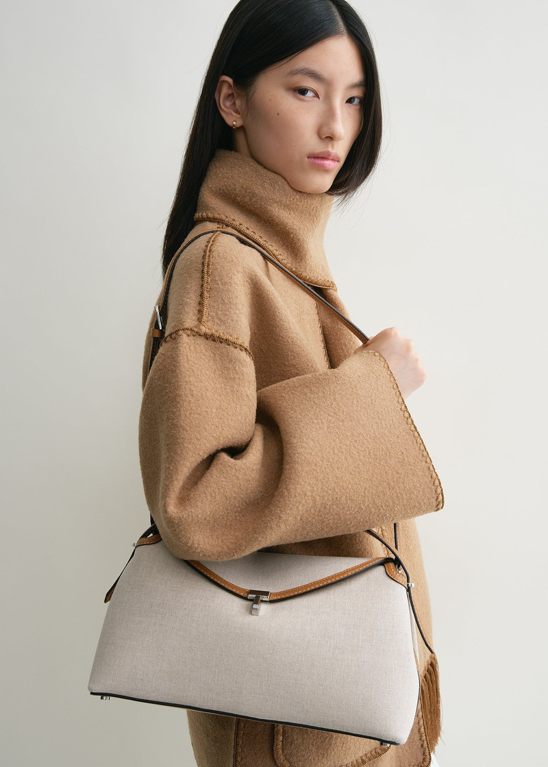 Totême T-Lock canvas top handle ecru/tan outlook
