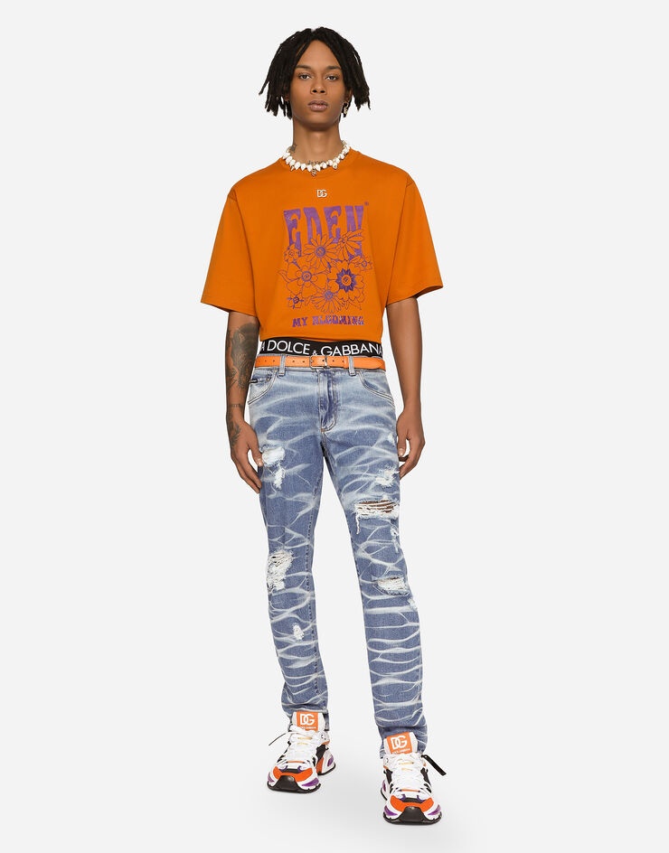 Light blue wash slim-fit stretch jeans with rips - 1