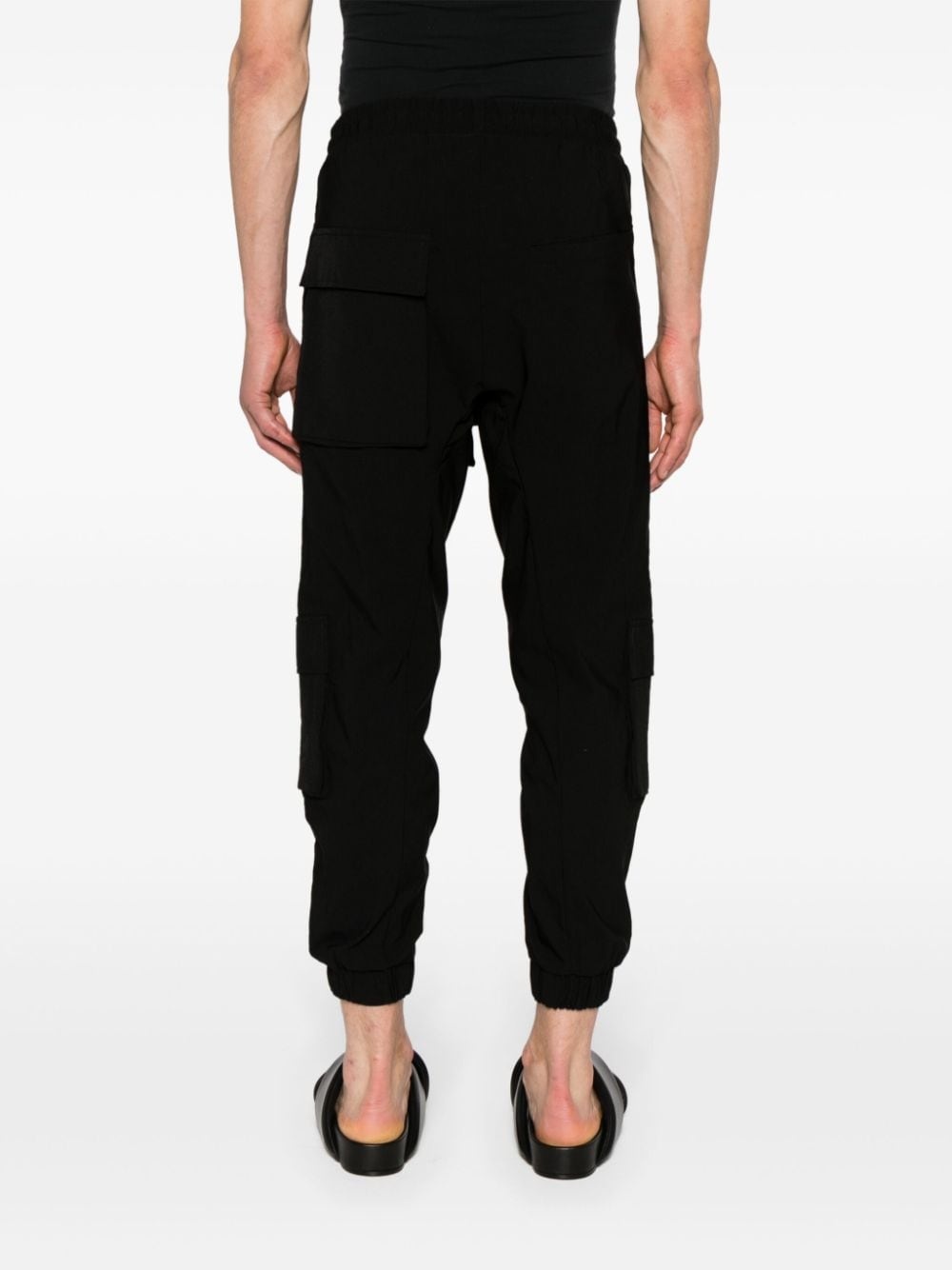 drop-crotch tapered-leg trousers - 4