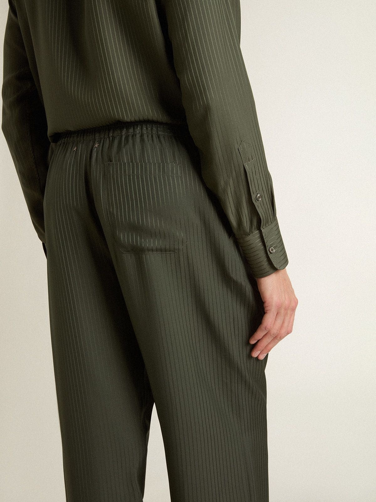 Men's dark green joggers with vertical stripes - 5