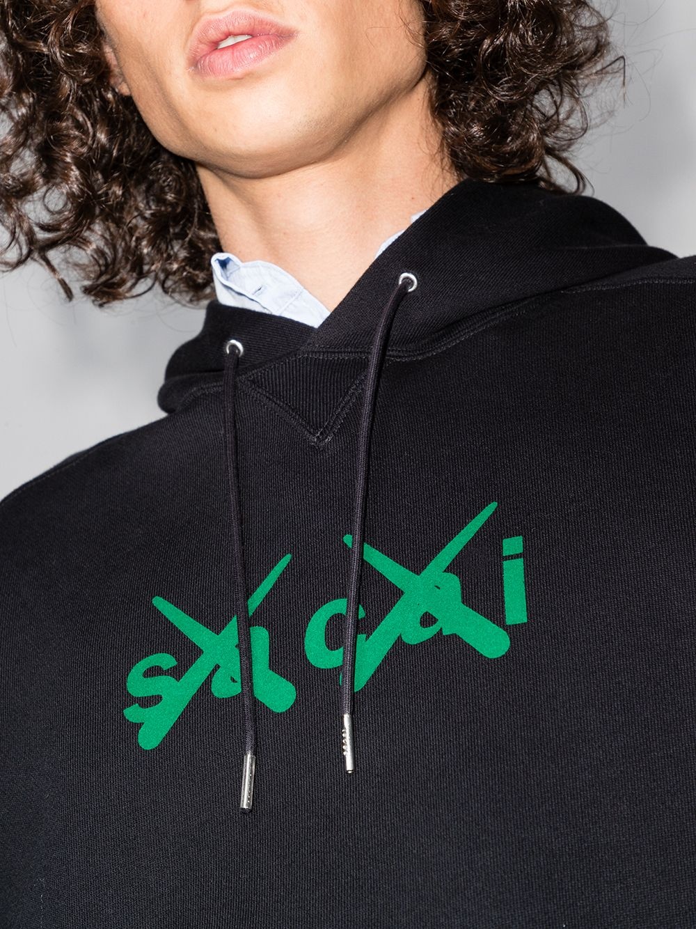 x KAWS logo-print hoodie - 4