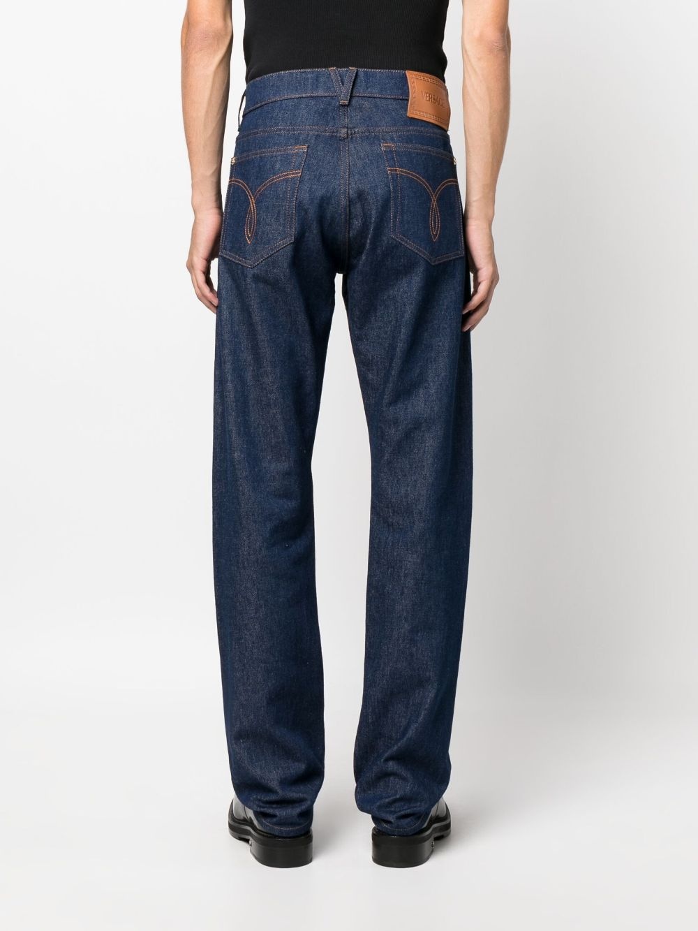 Medusa Head-detailed straight-leg jeans - 4