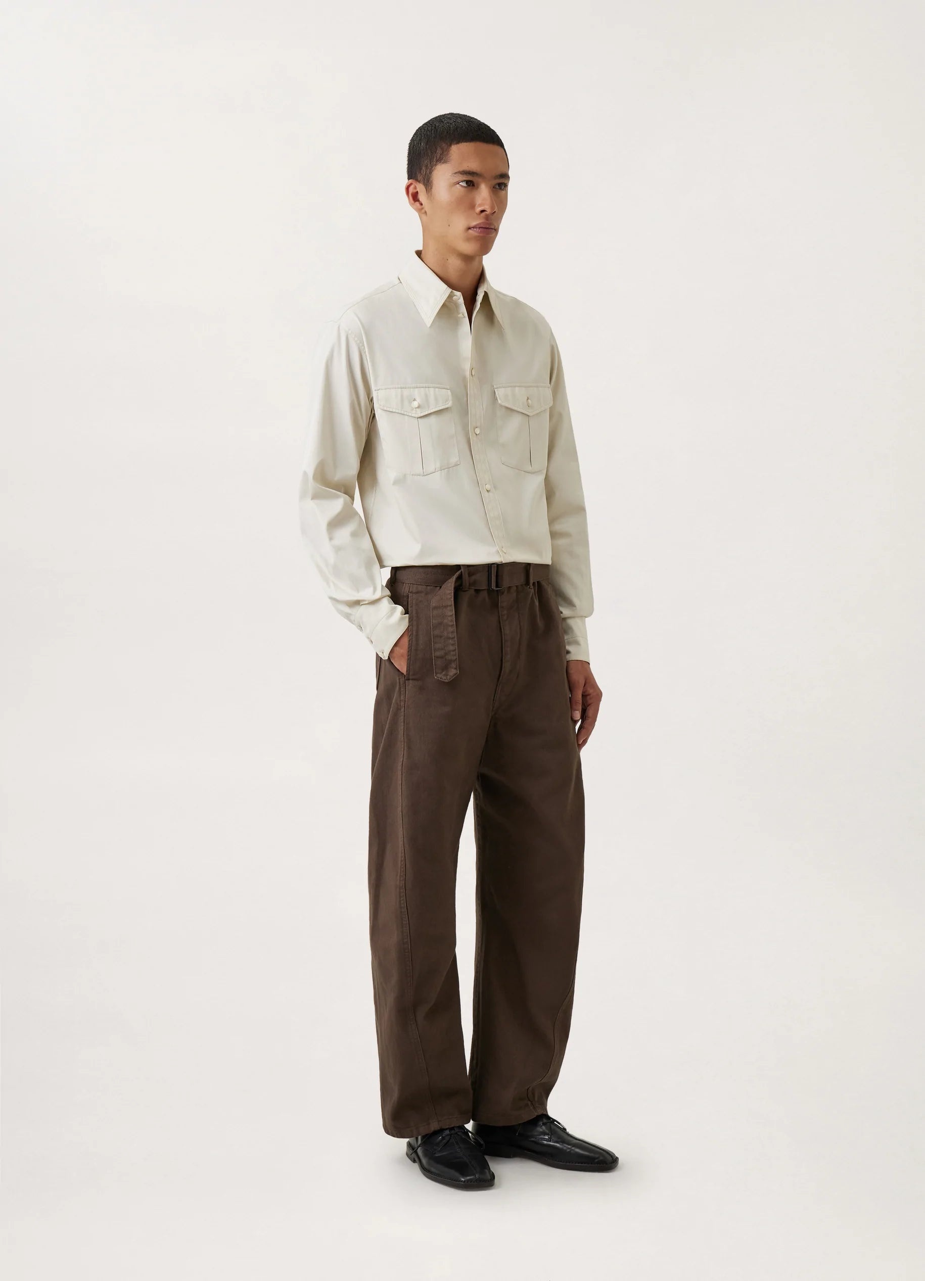 TWISTED BELTED PANTS
GARMENT DYED DENIM - 4