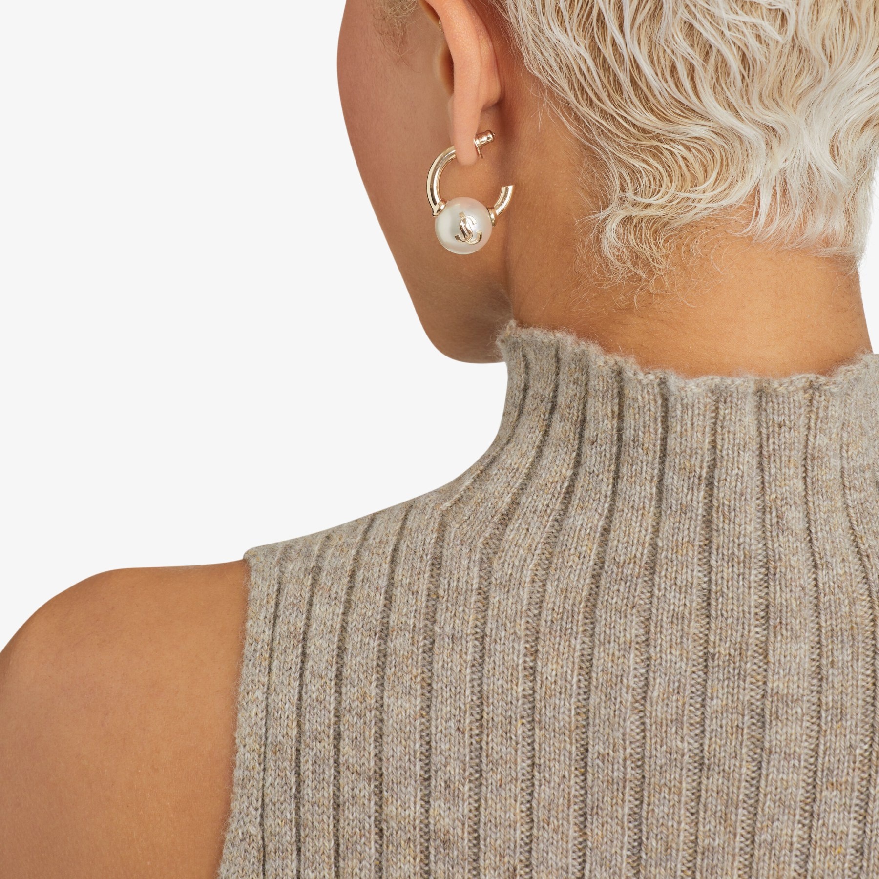 Pearl Crystal Hoops
Gold-Finish Metal Hoop Earrings with Pearls and Crystals - 2
