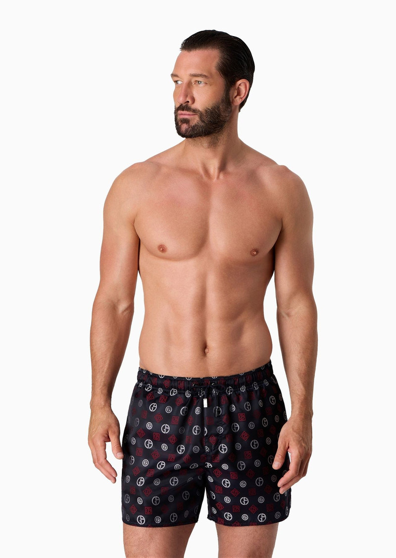 Swim trunks with an all-over logo jacquard 2