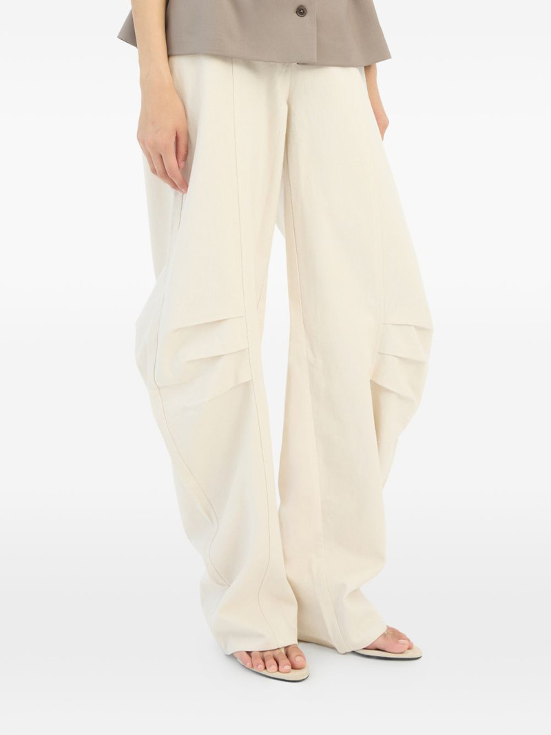 cream tapered trousers 4