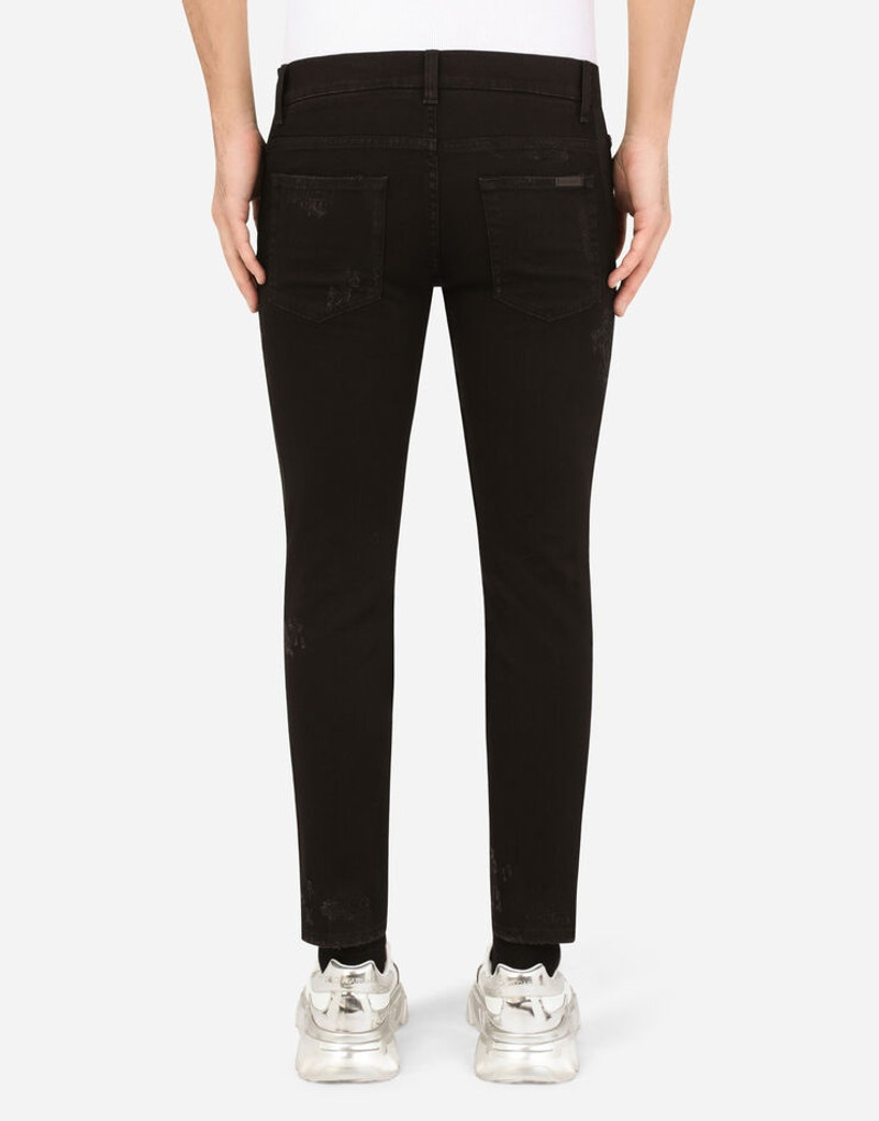 Dolce & Gabbana Black repaired skinny jeans with DG patch outlook