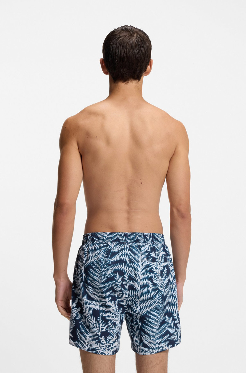 HUGO LOGO-DETAIL SWIM SHORTS WITH ALL-OVER PRINT outlook