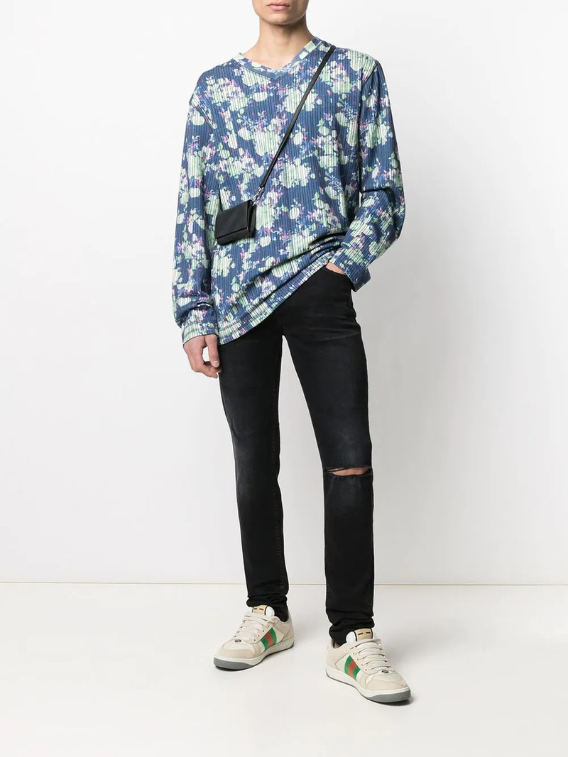 AMIRI distressed skinny jeans outlook