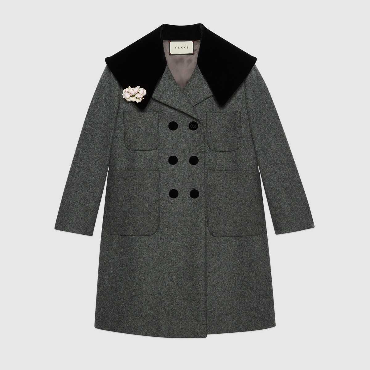 Wool coat with floral brooch - 1