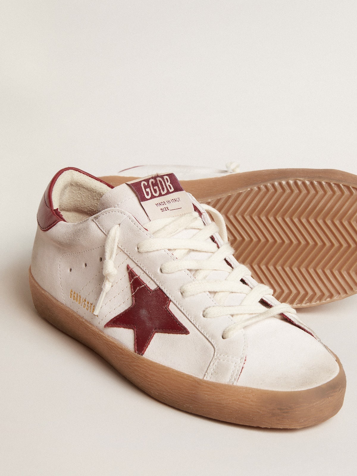 Golden Goose Super-Star in white suede with burgundy leather star 