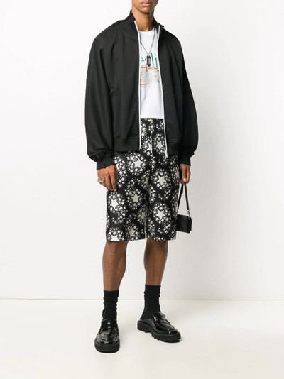 GUCCI star print knee-length shorts outlook