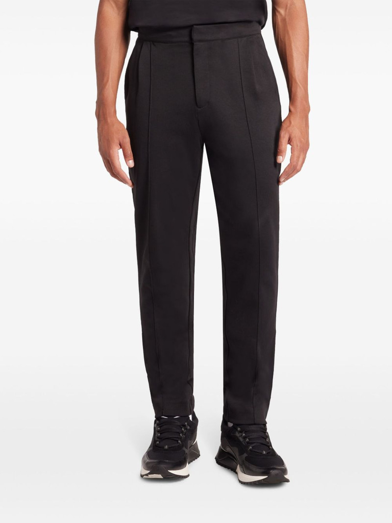 MICHAEL KORS pressed-crease tapered trousers outlook