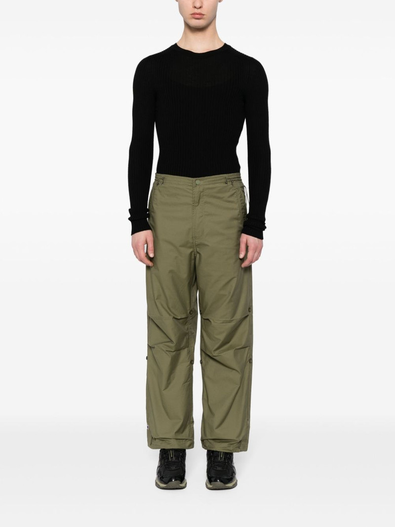 MAHARISHI x Jean-Michel Basquiat wide-leg trousers outlook