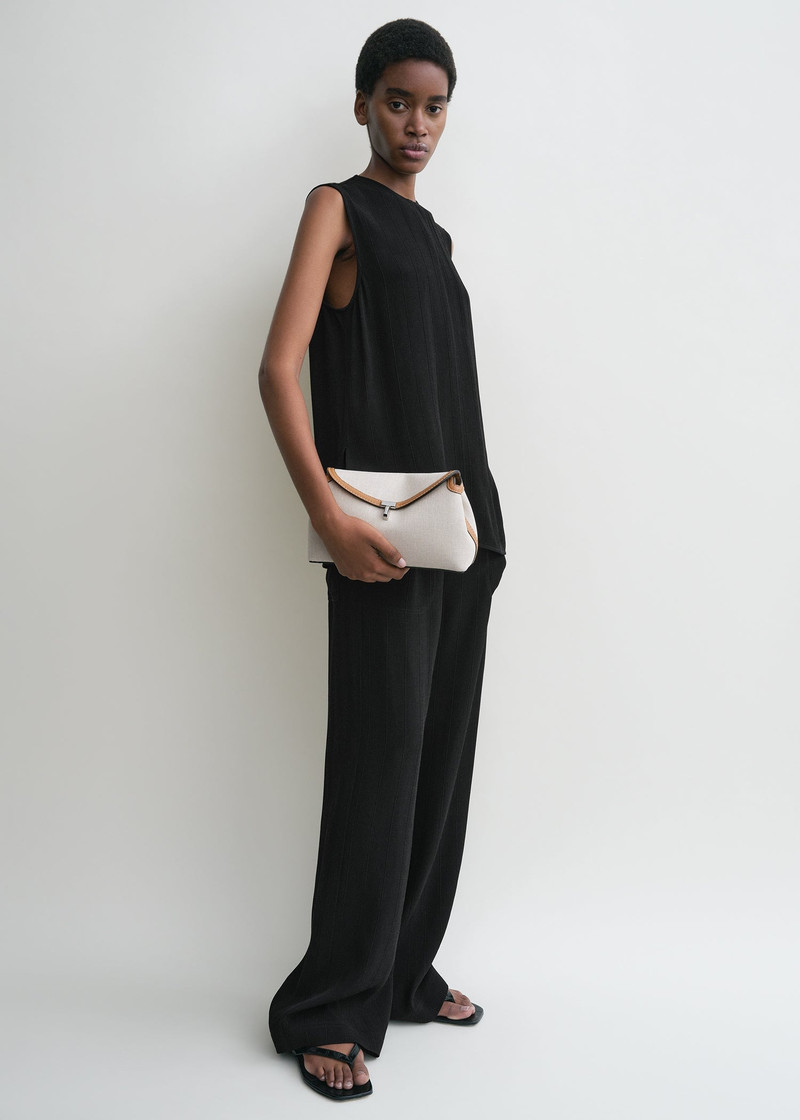 Totême T-Lock clutch ecru/tan outlook