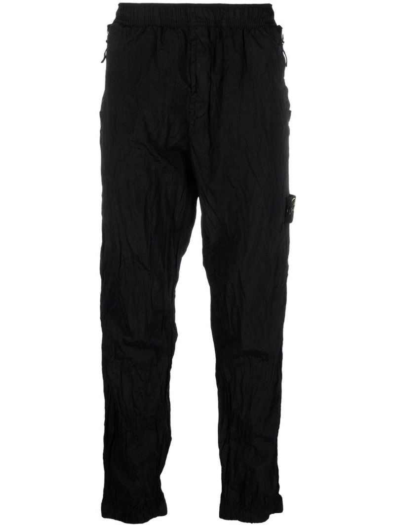 Compass-motif track pants - 1