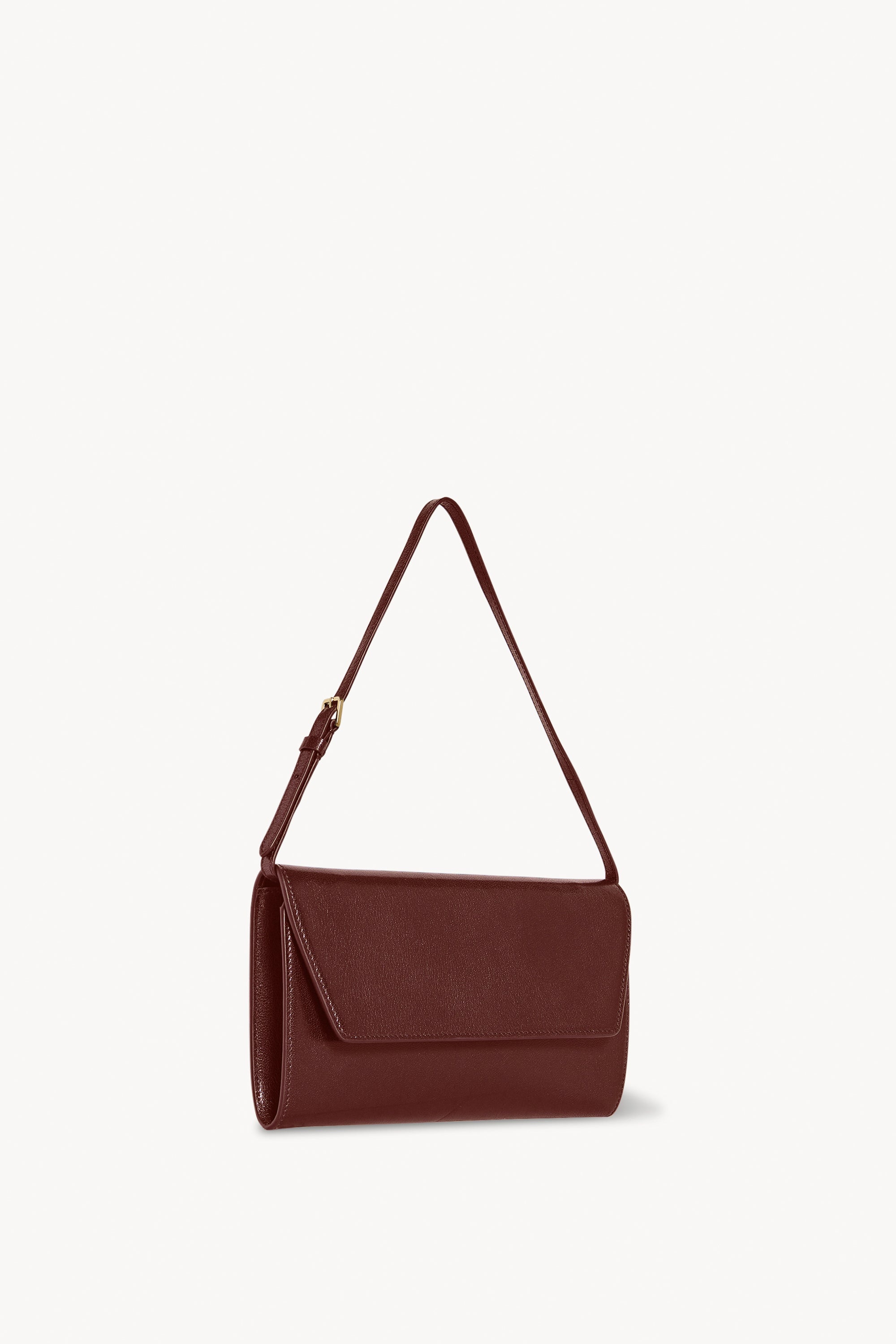トートバッグ [The Row] Evening Clutch in Leather Evening leather clutch in beige - The Row | Mytheresa