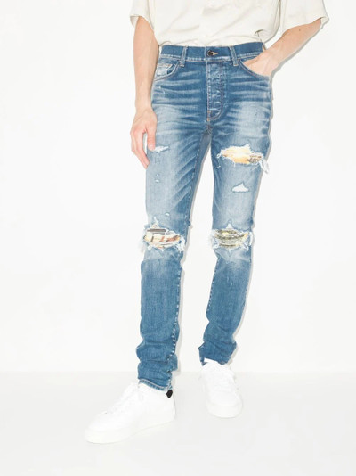 AMIRI distressed-effect skinny jeans outlook