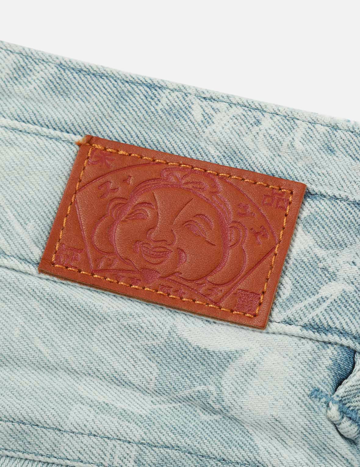LASER-PRINT ALLOVER PEACOCK DENIM TAPER JEANS - 10