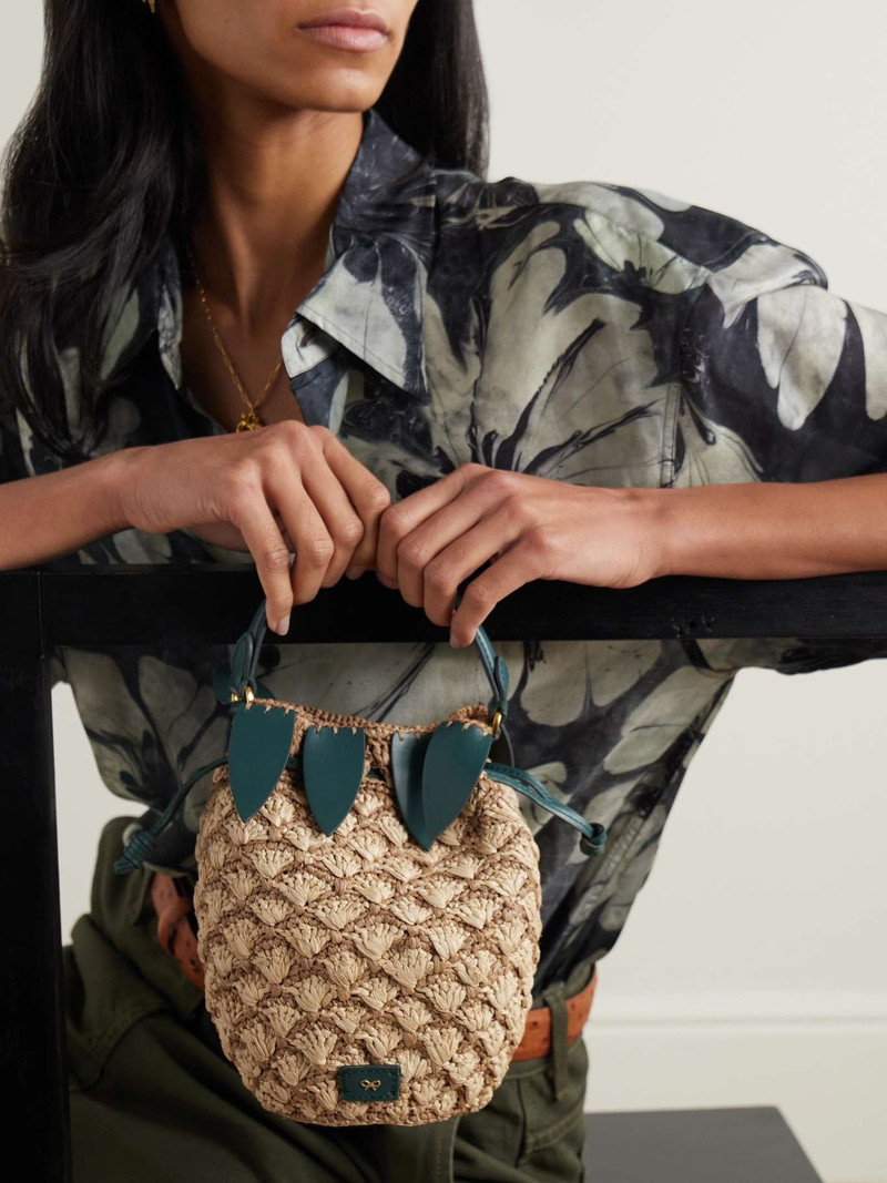 Anya Hindmarch Pineapple leather-trimmed raffia bucket bag Neutral outlook