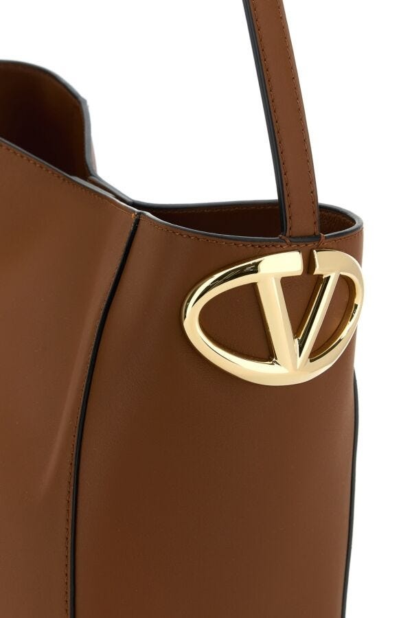 Valentino Brown leather VLogo bucket bag | gebnegozionline