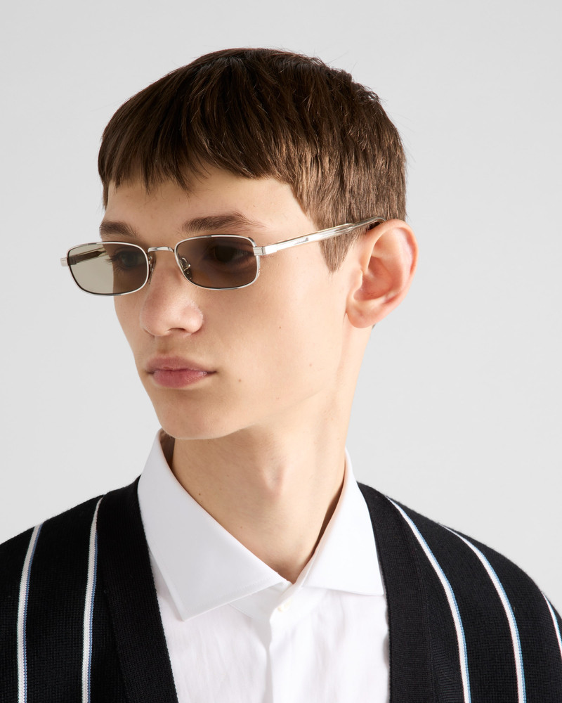 Prada Sunglasses with the iconic metal plaque outlook